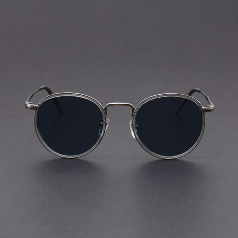 Elegant unisex metal frame sunglasses with dark lenses, offering anti-glare properties & full UV protection.