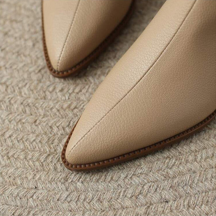Everyday elegant women's ankle boots. Pointed toe, low heel, and comfortable for all-day wear.