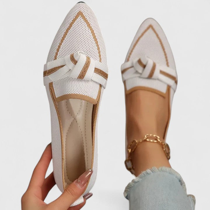Comfortable women's pointed toe flats, versatile for casual or dressy outfits. Chic slip-on loafers.
