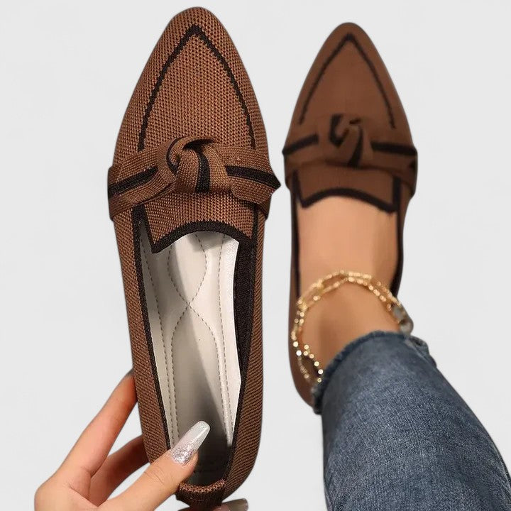 Women's pointed toe slip-on loafers featuring stylish contrast trim, ideal summer footwear.