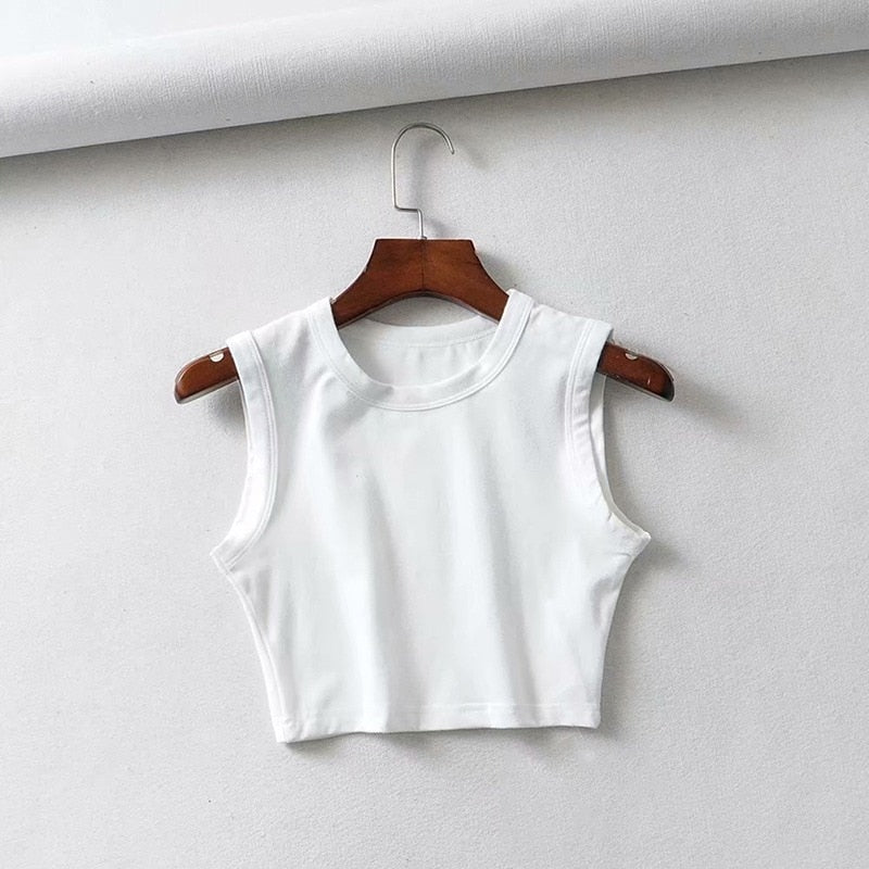 Lightweight women's sleeveless crop top, perfect for summer outfits & casual daily fashion. Fitted style.
