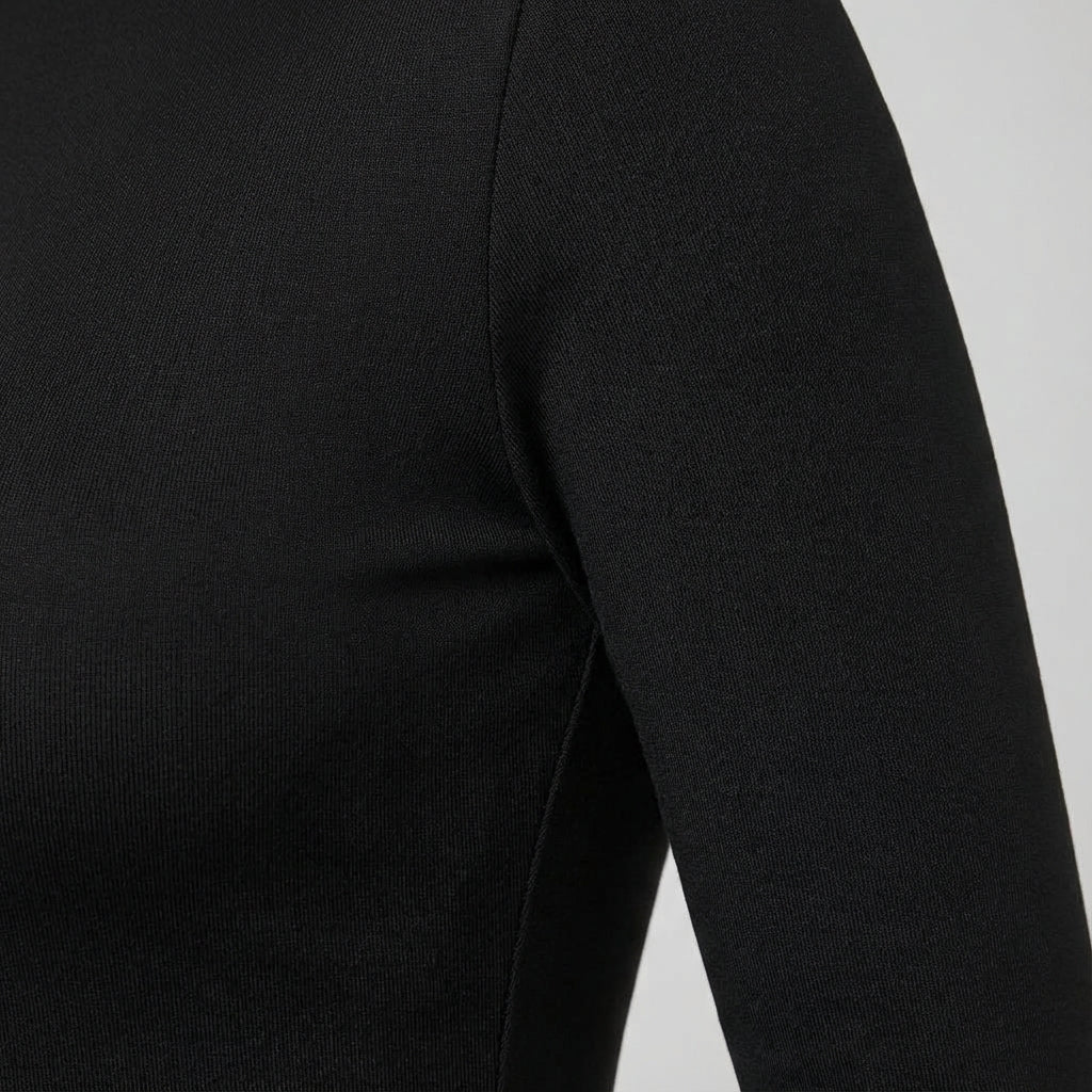 Women's insulating long sleeve thermal top in a slim fit, ideal for winter outdoor activities or sportswear.