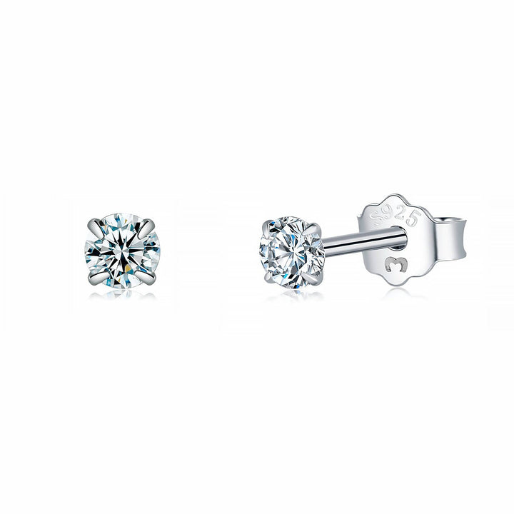 Classic zirconia stud earrings in gold plated finish, ideal women's jewelry.
