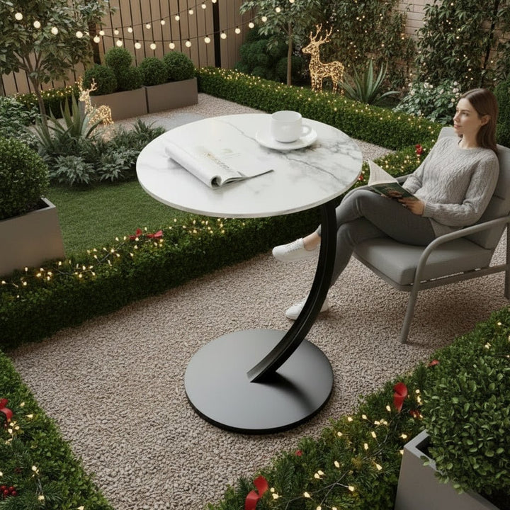 Close-up of the smooth top of the SMALLIX round side table, sleek modern design for small spaces.