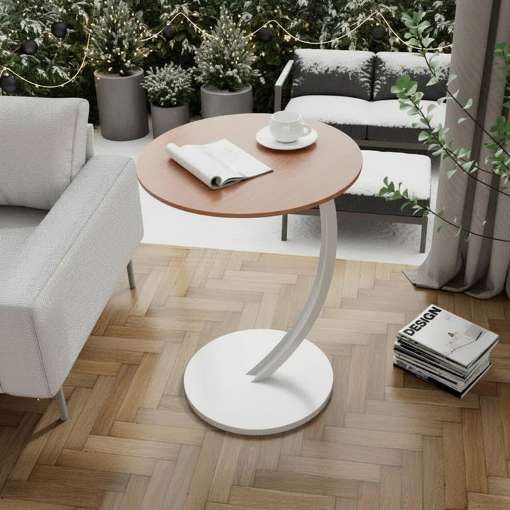 SMALLIX round side table used as a nightstand, adding modern compact design to any bedroom.