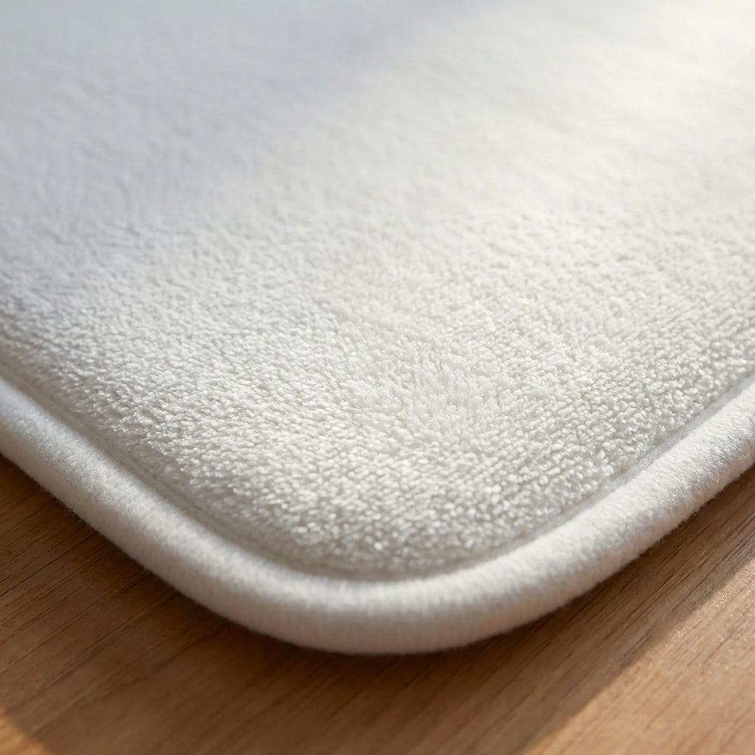 Unisex smart alarm mat, a stylish statement rug with wave pattern to boost productivity & help heavy sleepers wake up.