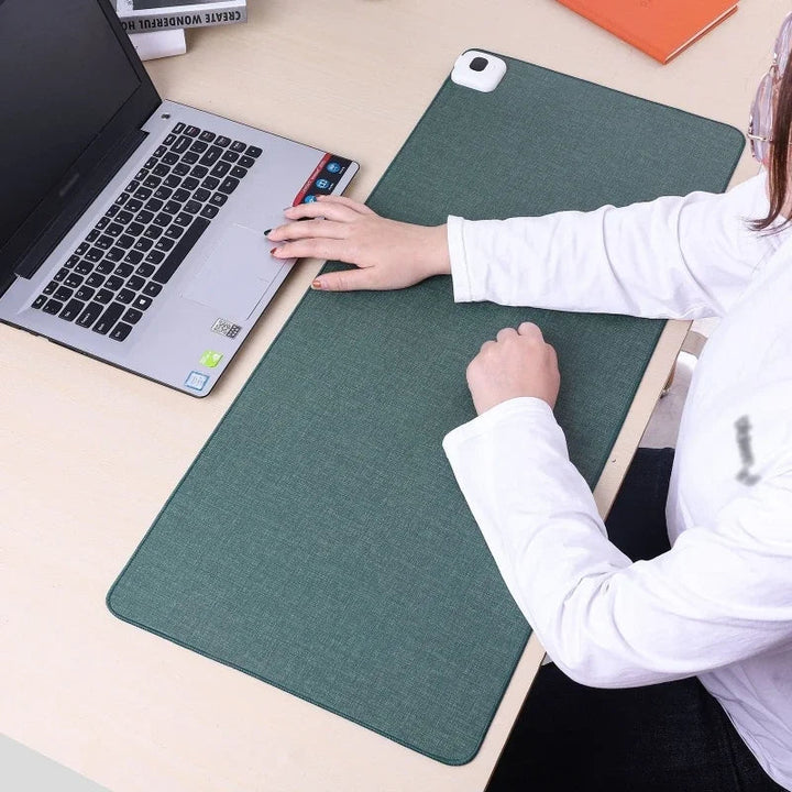 Smart heated mouse pad with temperature control, perfect for a warm home office desk.