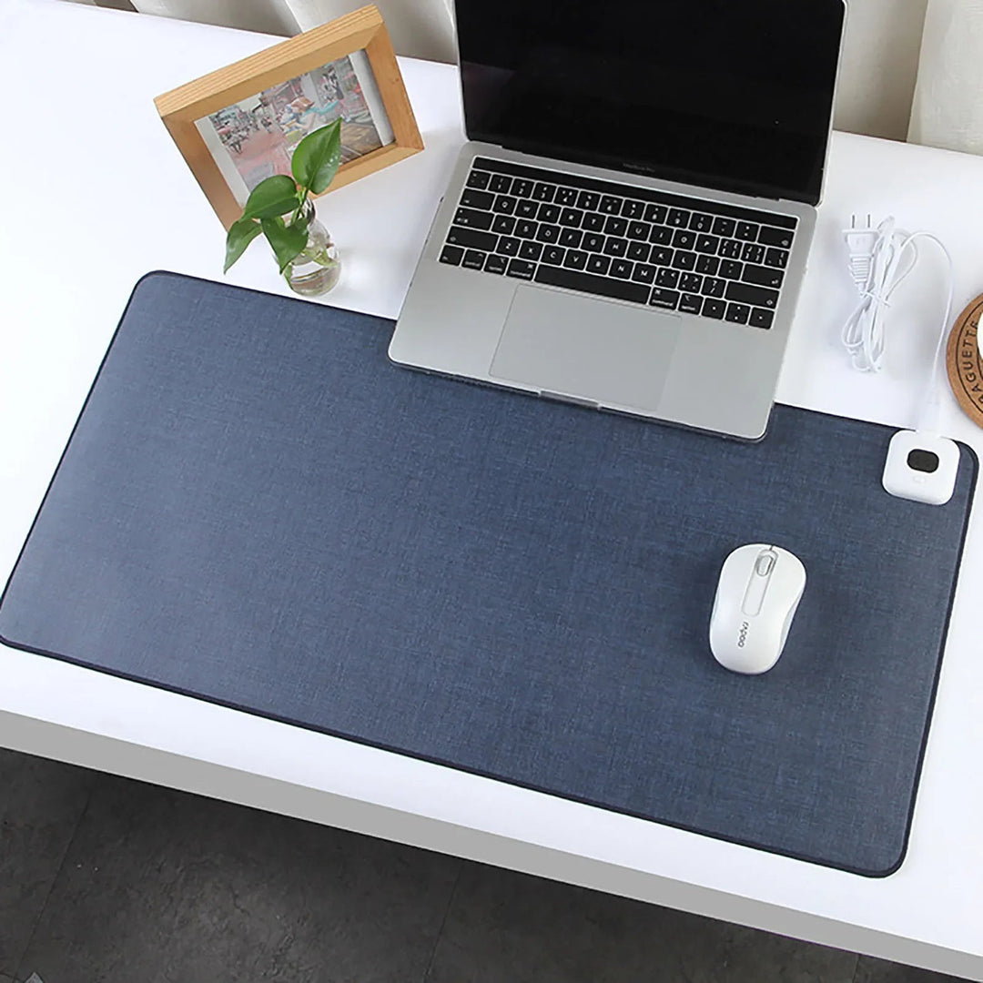Sleek heated mouse pad, a smart desk warmer for cold hands and focused work.