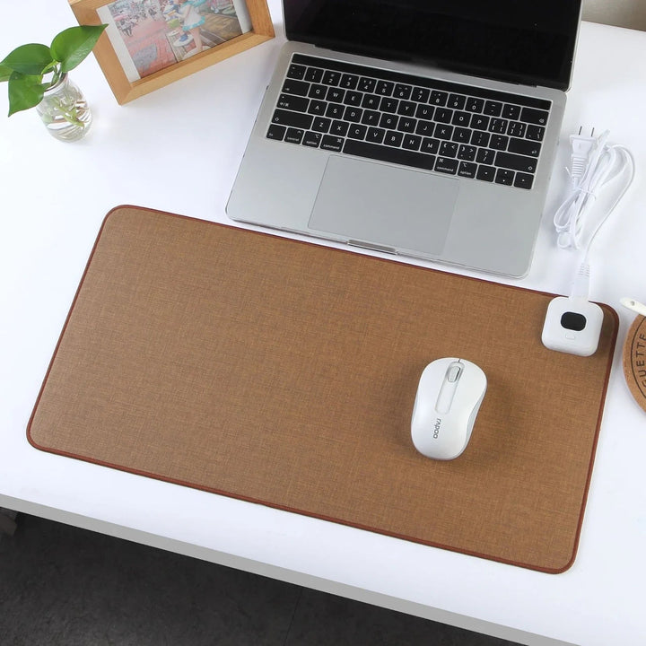 Unisex smart heated mouse pad with adjustable temperature, essential for home office.