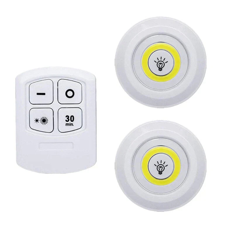 Remote control for smart LED puck lights, displaying timer and dimming functions clearly