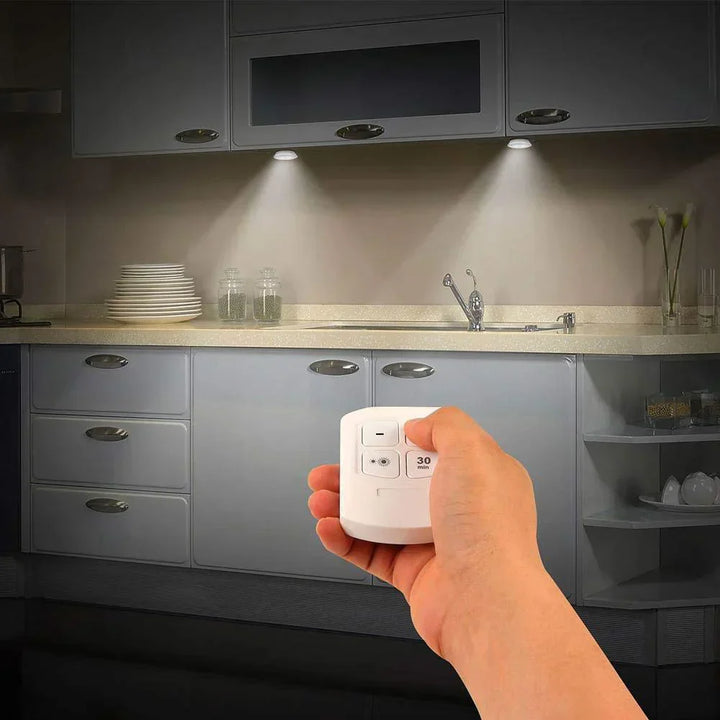 Packaging for smart LED puck lights with remote, emphasizing wireless and energy-saving features
