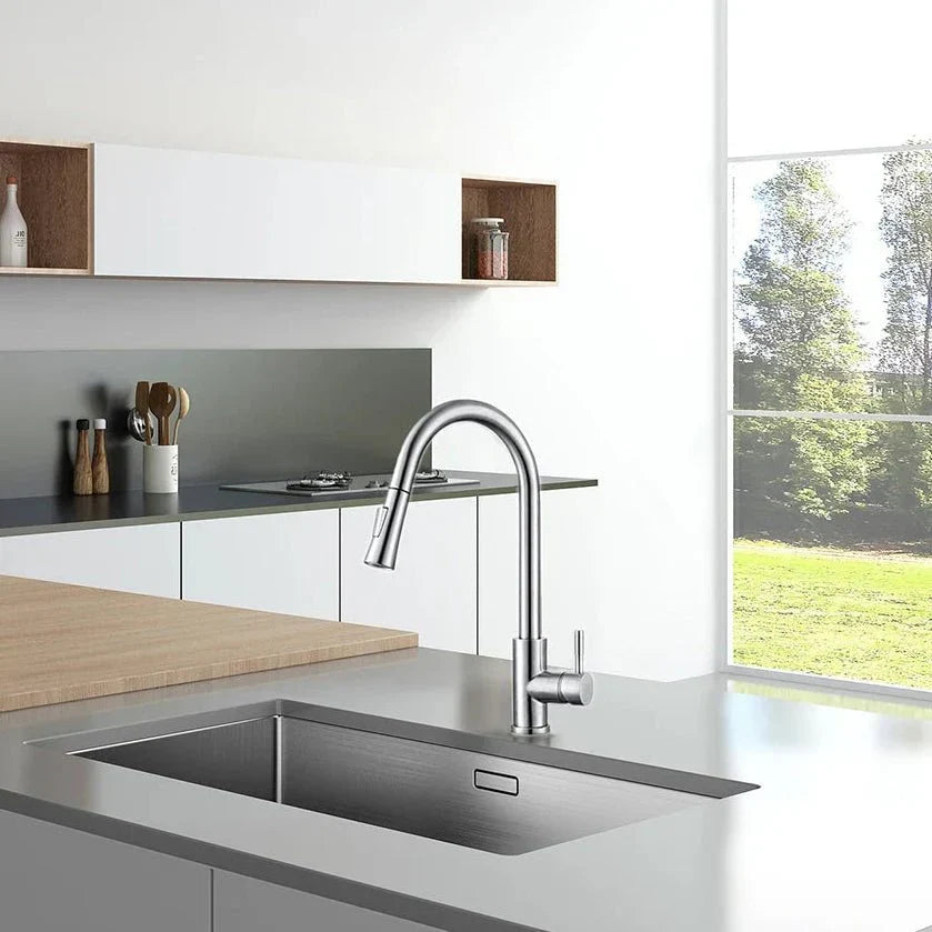Smart sensor kitchen faucet with pull-out sprayer head, ideal for modern touchless convenience.