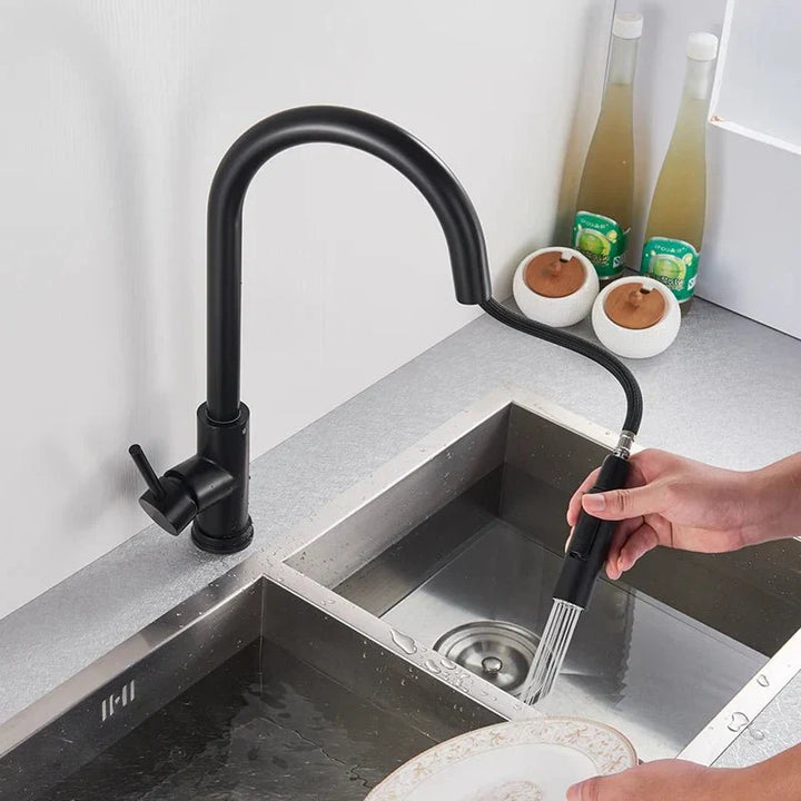 Silver smart sensor kitchen faucet with a flexible pull-out sprayer, enhancing home kitchen efficiency.