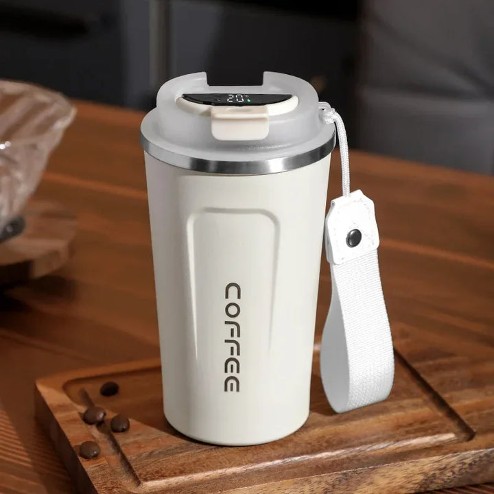 Vacuum insulated smart thermo mug, stainless steel, with digital display for precise drink temp.
