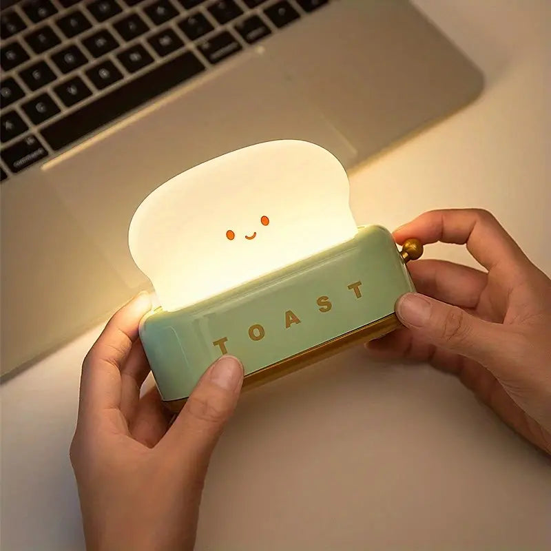 Smiling toast night light, rechargeable LED lamp for kids' bedroom or nursery decor.