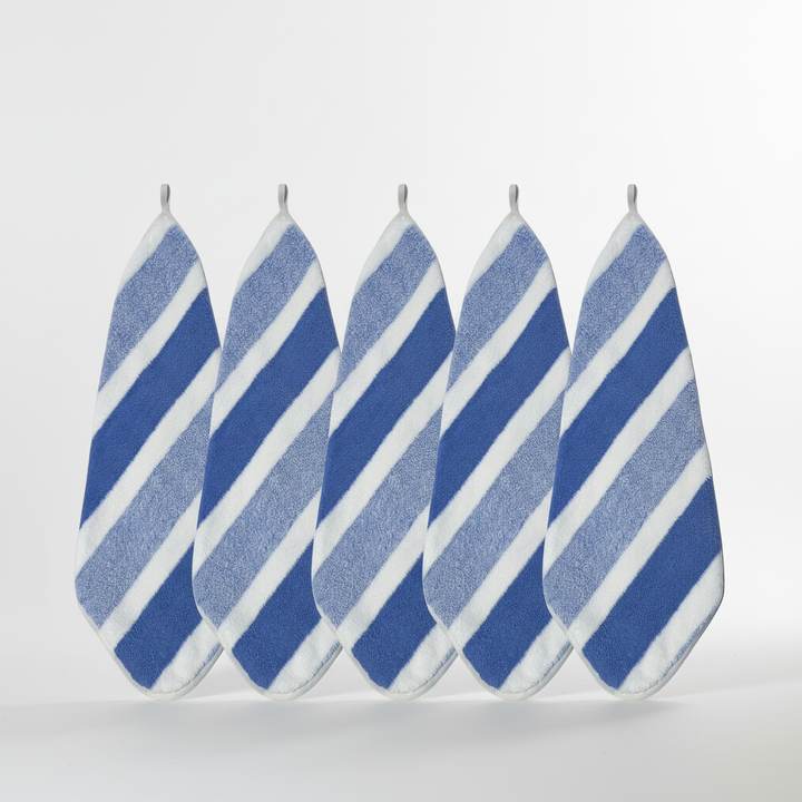 Detail of striped pattern on a quick-dry coral fleece towel, home textiles, modern design