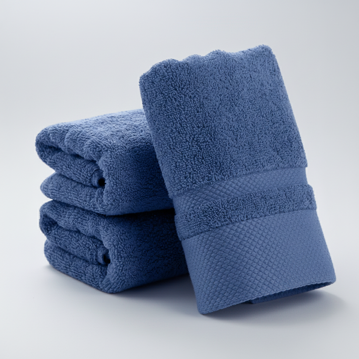 Close-up of a soft absorbent cotton blend bath towel, showcasing its texture and quality