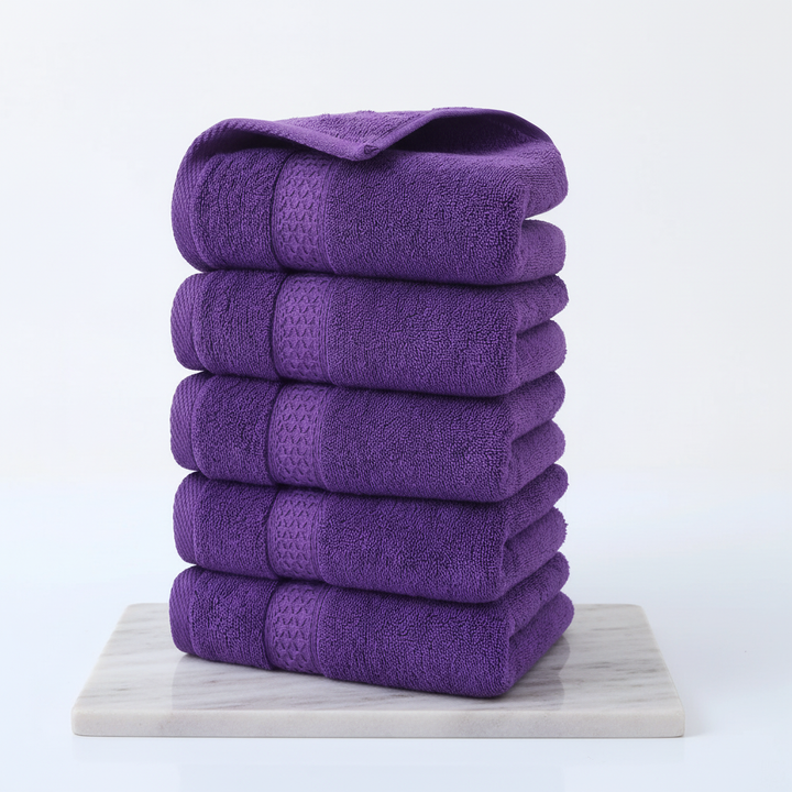 Absorbent 'CottonJoy' bath towel set, featuring two large bath towels and two hand towels for home.