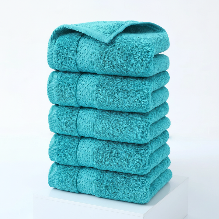 Eco-friendly 'CottonJoy' cotton towels, part of a 4-piece set, offering ultimate softness & absorbency.