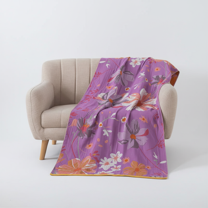 Elegant lavender floral cotton bath towel, highly absorbent, adds a touch of nature to any bathroom decor.
