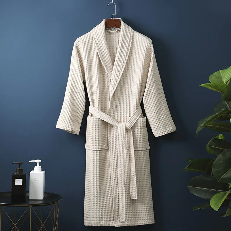 Soft cotton unisex bathrobe for ultimate comfort and relaxation at home.