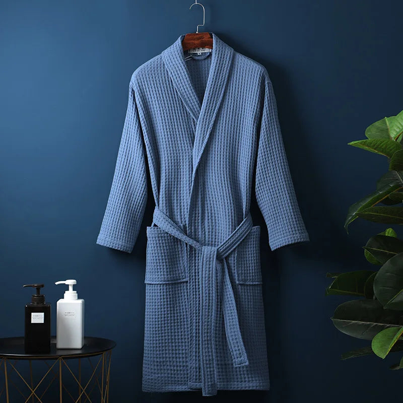 Ultimate relaxation in this soft cotton unisex bathrobe, perfect for home loungewear.
