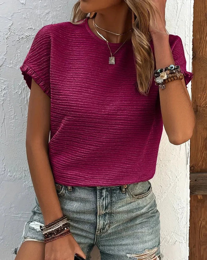 Breathable women's cotton t-shirt in light blue, an essential for everyday wear.