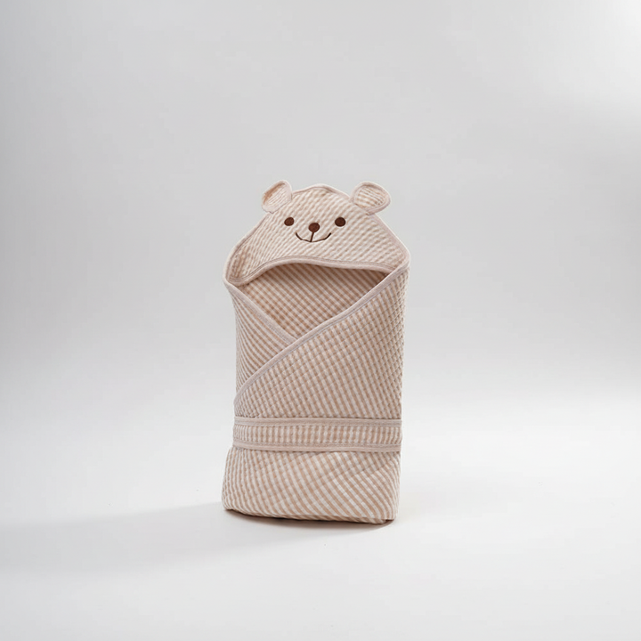 Folded DreamWrap cotton baby swaddle, ready to provide infant sleep comfort and security