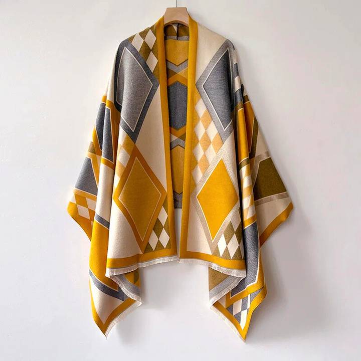 Soft, elegant women's winter cashmere shawl. Luxurious warm fashion accessory, perfect for stylish layering.