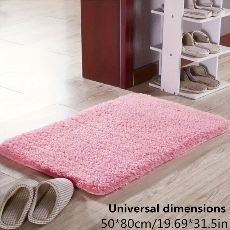 Luxury soft bath mat, non-slip backing, highly absorbent, modern geometric design.