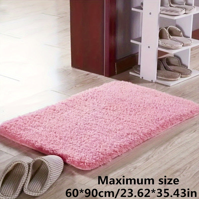 Plush non-slip bath mat, soft polyester, absorbent, adds luxury to home decor.