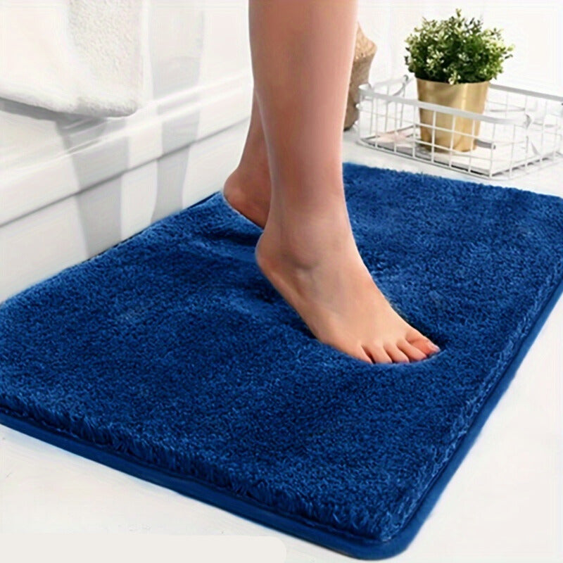 Premium non-slip bath mat for bathroom, soft, absorbent, and decorative.