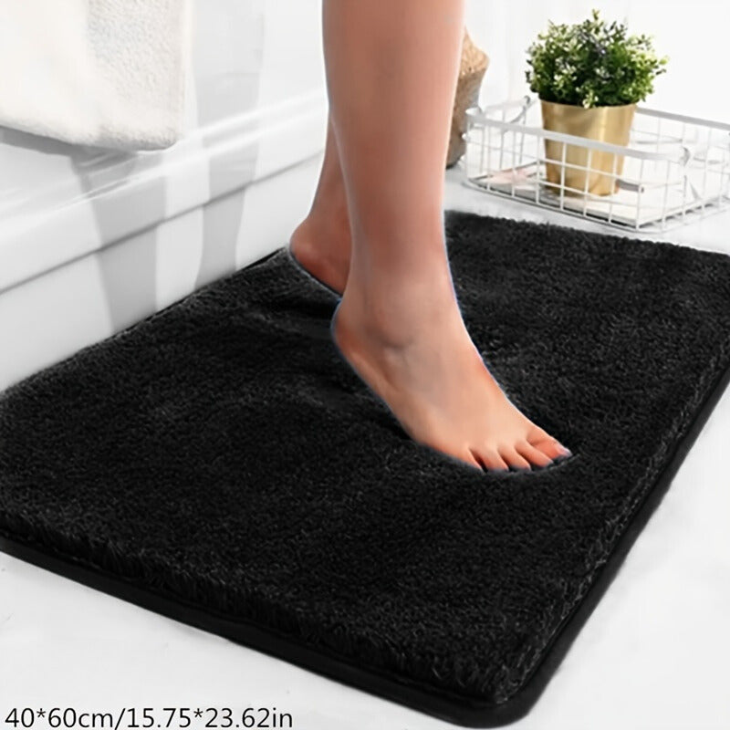 Soft comfort bath mat with stylish geometric pattern, non-slip & absorbent home textile.