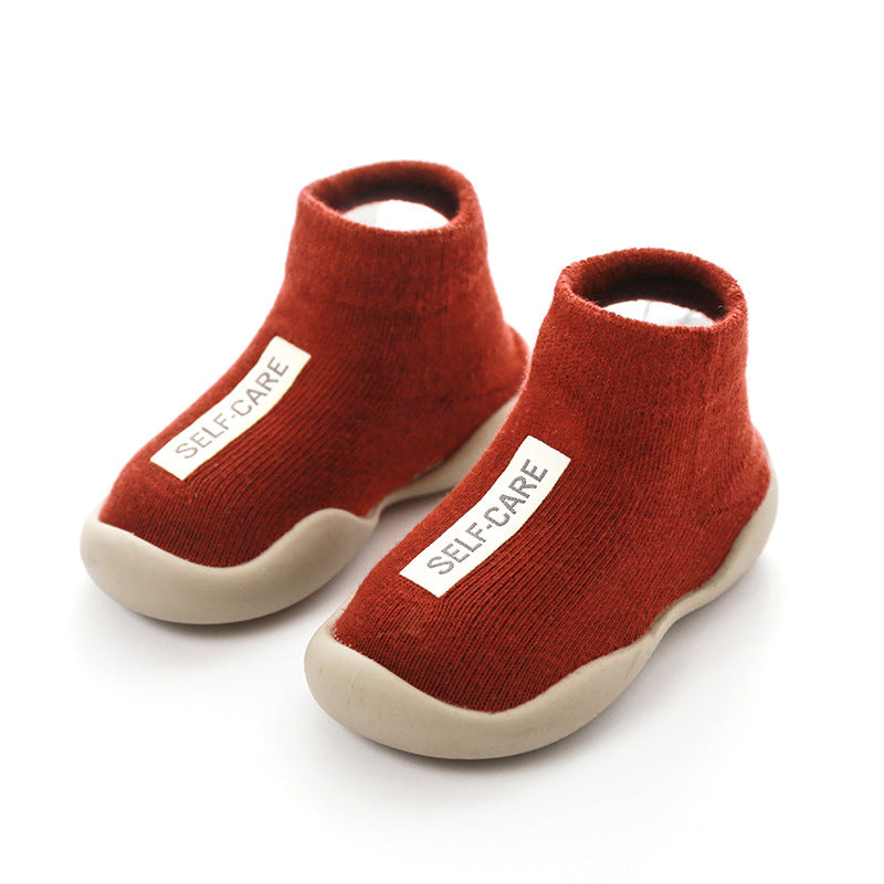Grey knitted toddler booties, anti-slip bottom, warm and safe play shoes for kids