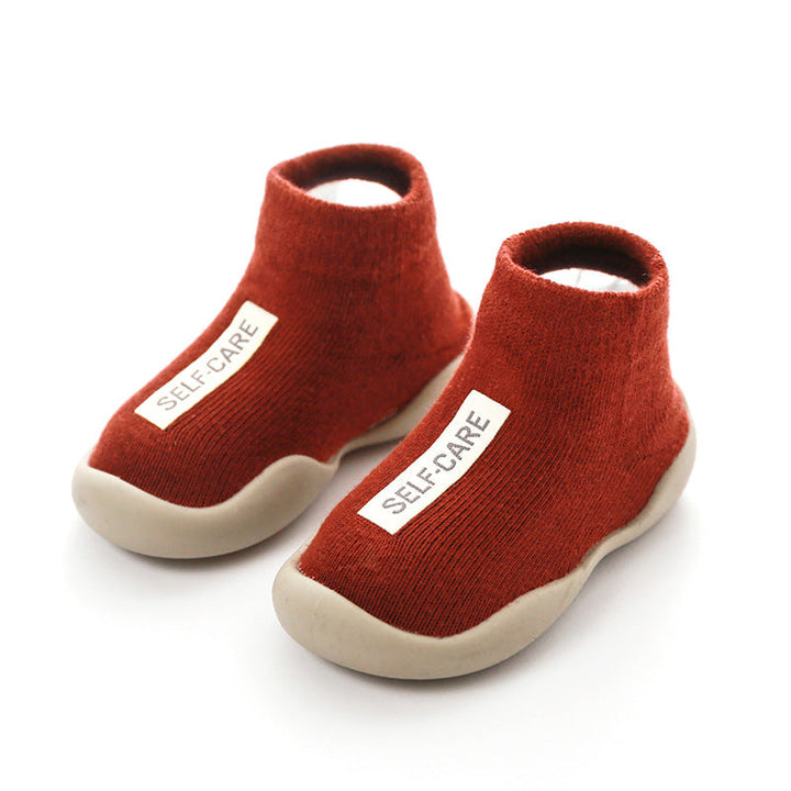 Grey knitted toddler booties, anti-slip bottom, warm and safe play shoes for kids