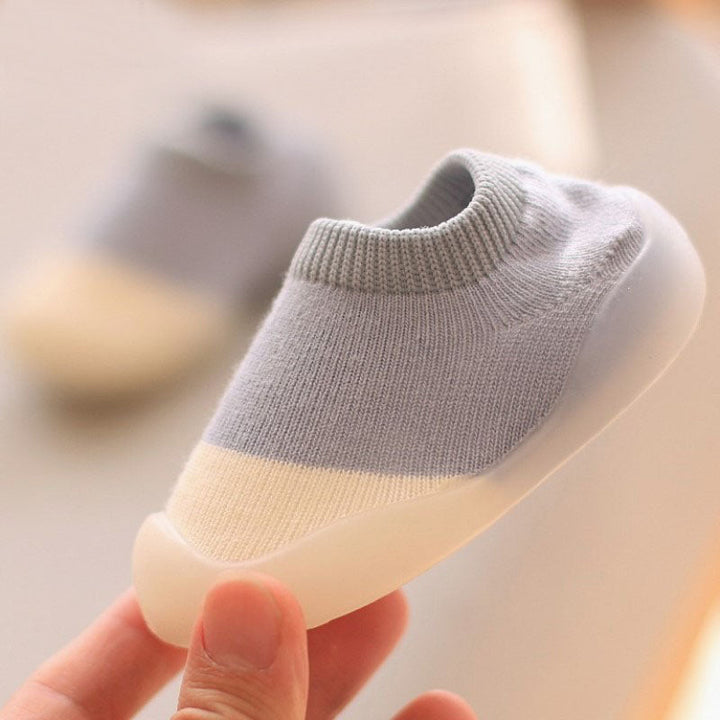 Comfortable knitted toddler shoes with anti-slip grip, ideal for active babies