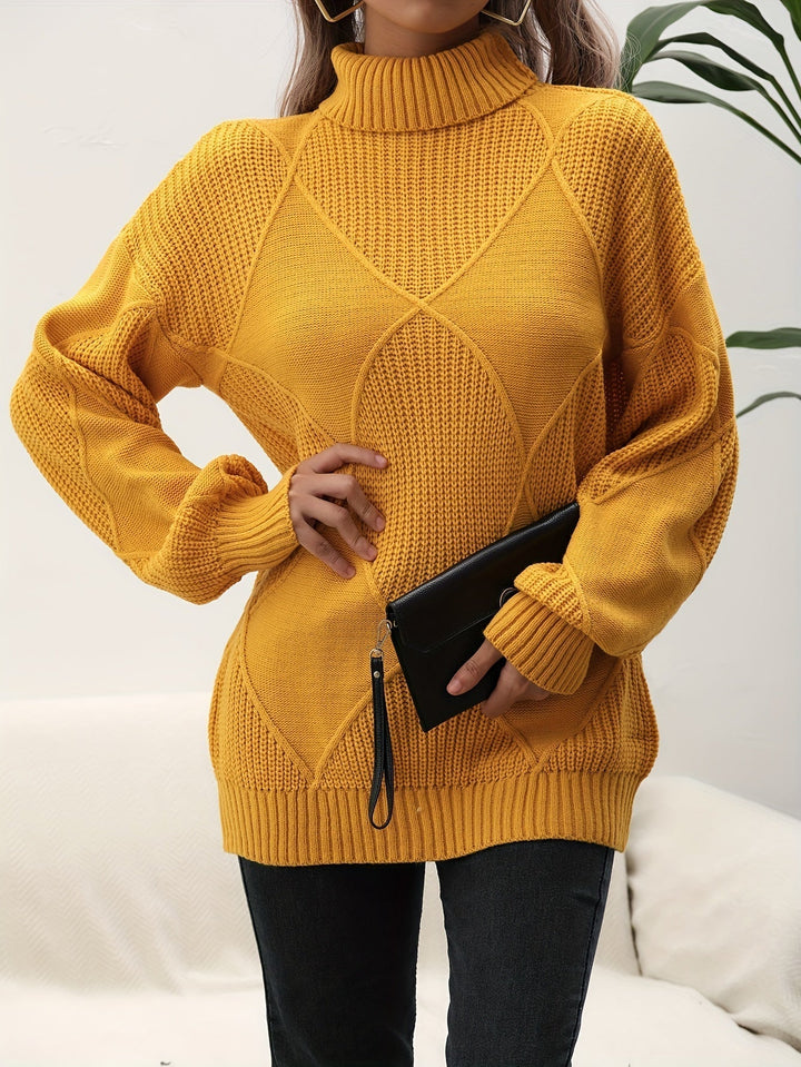 Soft knitted women's turtleneck sweater with dropped shoulder, perfect for comfortable autumn & winter fashion.