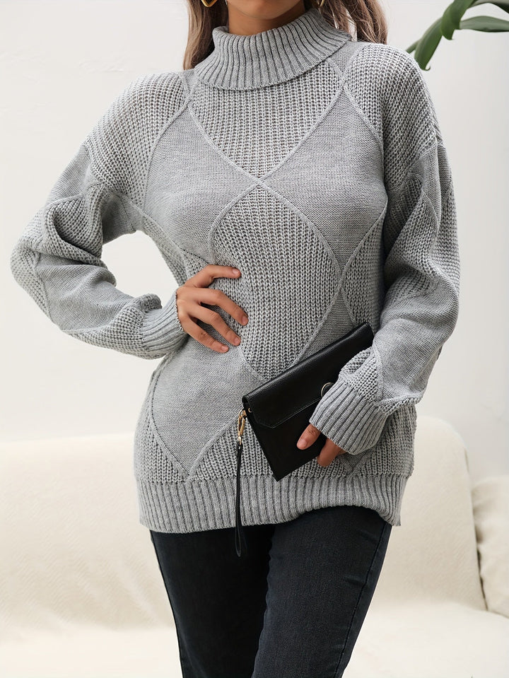 Cozy women's knit turtleneck sweater for winter comfort. Versatile dropped shoulder design for casual style.