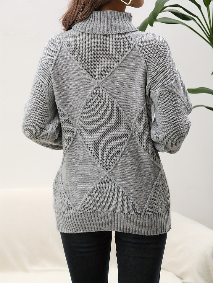 Comfortable yellow women's knitted turtleneck sweater with dropped shoulder, a cozy choice for winter fashion.