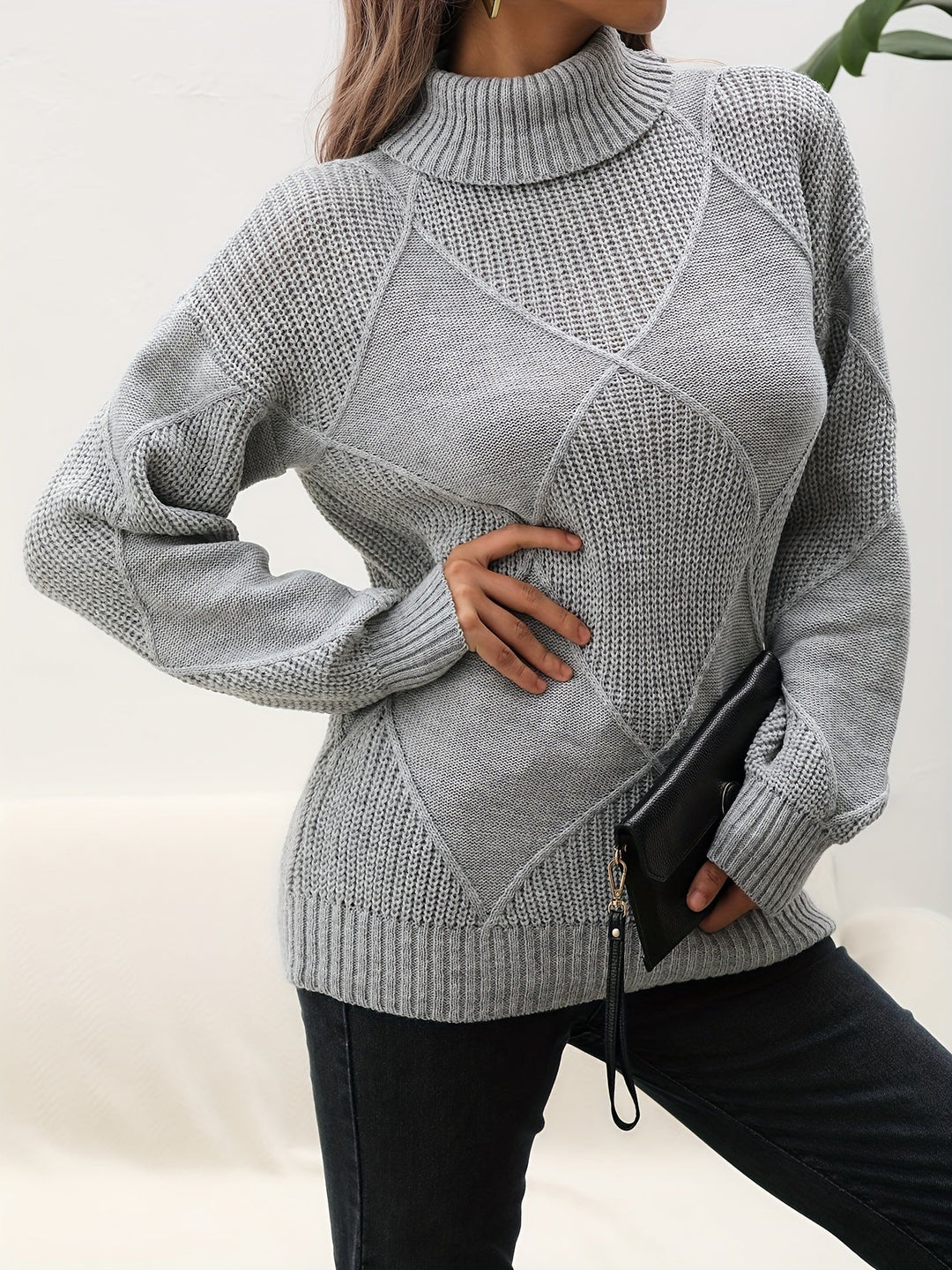 Stylish women's knitwear: Soft turtleneck sweater with dropped shoulder. Ideal for comfortable winter and autumn.
