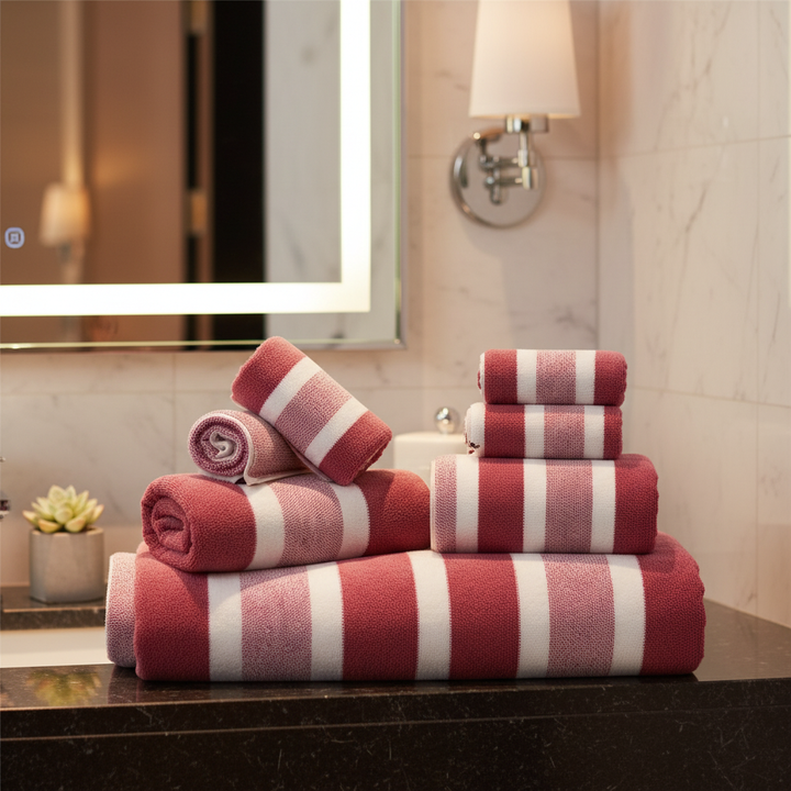 Soft microfiber plush throw blanket, cream color, draped over a sofa arm for cozy comfort