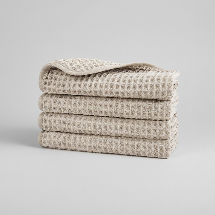 Ergonomic shot of a microfiber waffle washcloth, perfect for a gentle yet effective exfoliating cleanse