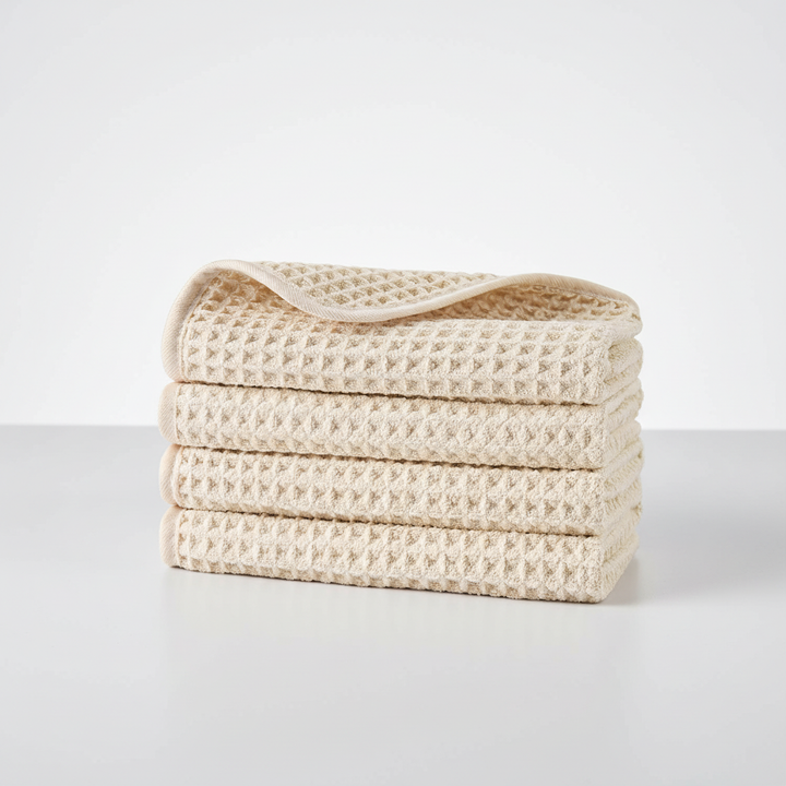 Detail shot of the microfiber fabric in a waffle pattern, emphasizing its exfoliating yet soft quality