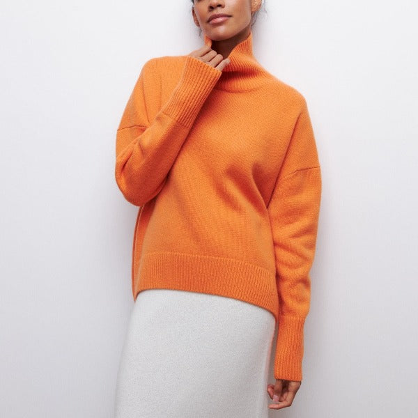 Chic oversized turtleneck sweater, soft knit for cozy fall & winter fashion.