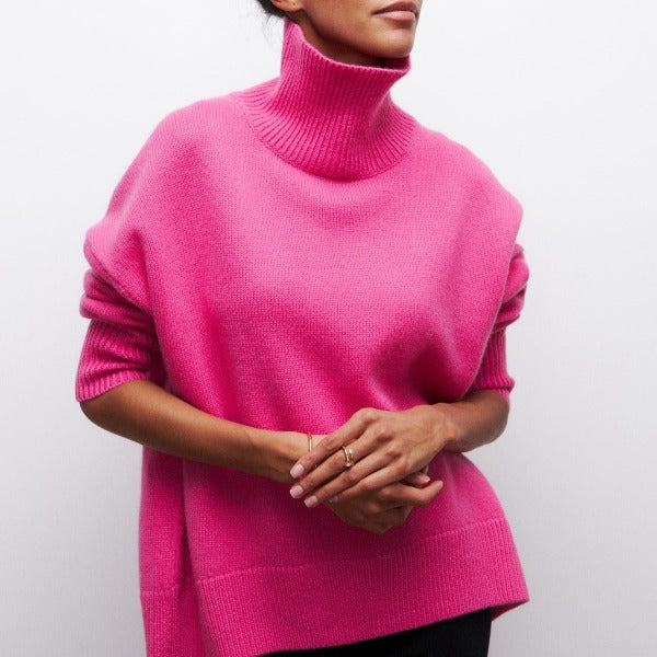 Warm, soft knit oversized turtleneck sweater for women, perfect winter fashion.
