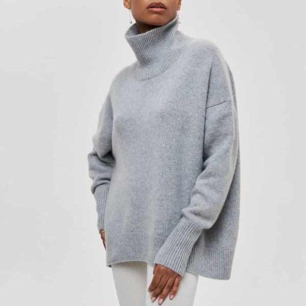 Ultra-soft oversized women's turtleneck sweater, a comfy knit pullover for chilly days.