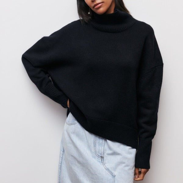 Women's cozy oversized turtleneck sweater in soft knit, great for fall & winter casual wear.