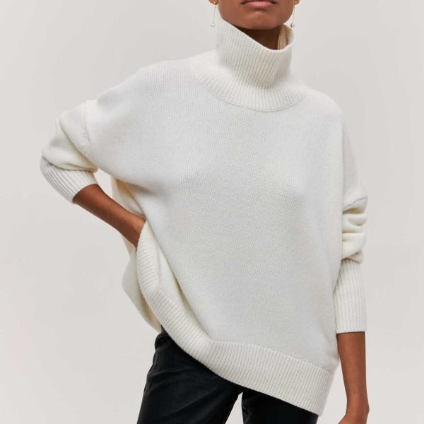 Versatile women's oversized turtleneck pullover, soft knit for cozy fall, winter & casual style.