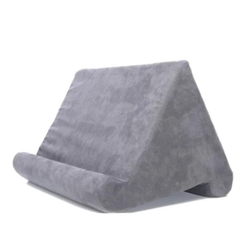 Ergonomic soft cushion tablet stand pillow for hands-free device viewing & reading comfort.