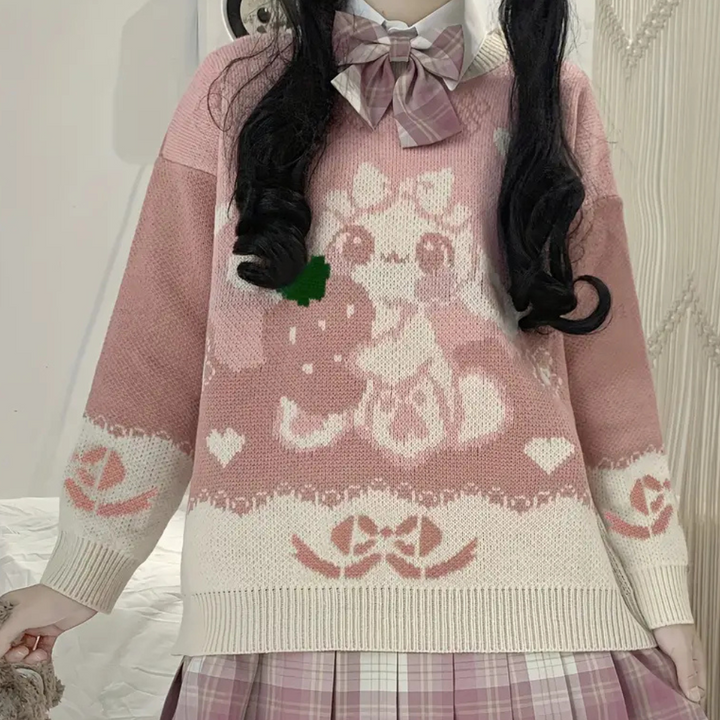 Casual pink women's knit sweater featuring a soft round neck. Ideal everyday acrylic pullover.